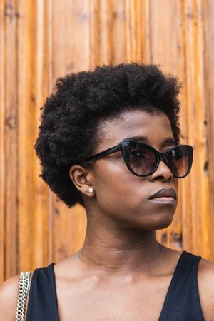 Sad Black woman with Afro hairstyle looking at camera