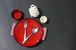 Settings of cutlery on the table