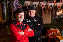 Two older men in country western attire