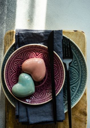 Ornate plates with pastel ceramic heart