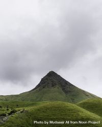 Mountain peak with gloomy clouds above beOo65