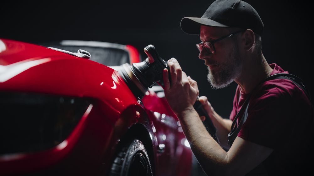 Portrait of an Adult Man Working in a Detailing Studio,