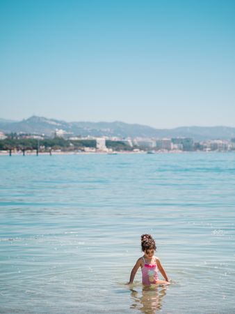 Cheerful bathing in warm sea
