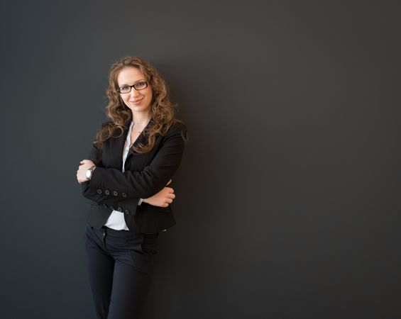 Gorgeous female posing in business suit