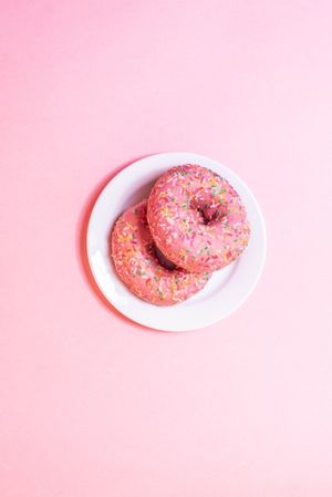 Pink doughnuts in a colorful background