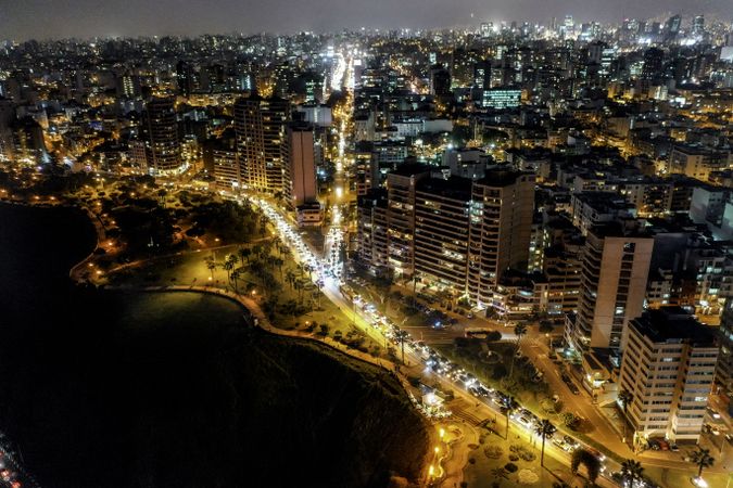 Aerial view of city buildings during night time in Lima, Peru