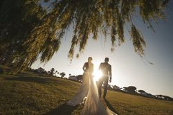 Marriage of woman and man holding hands in park