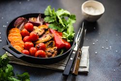 Pan of grilled vegetable on napkin