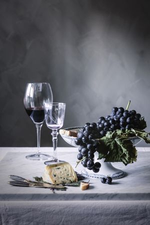 Grapes and wine on table