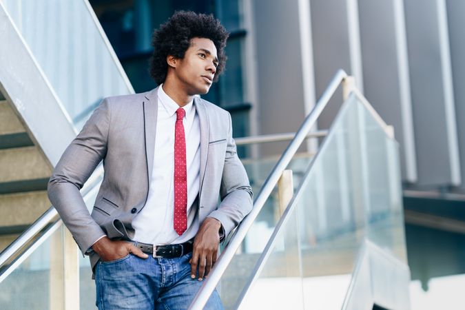 Man in business casual on stairs