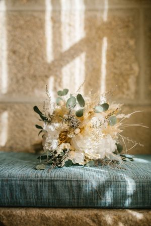 Elegant bouquet on soft cushion