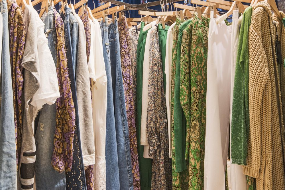 Clothes rack of Bohemian style outfit in fashion store