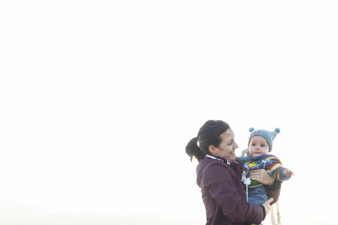 Portrait of a cute baby and her mother.