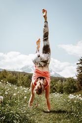 Woman hand standing in flower field
