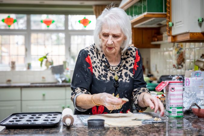 Woman baking in kitchen