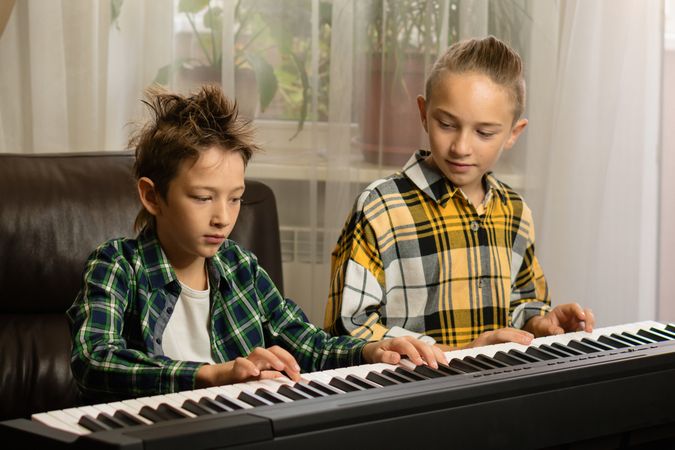 Brothers Sharing Piano Moments