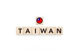 Wooden blocks bearing the name and flag of Taiwan.
