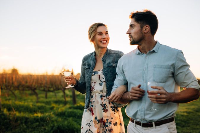 Loving couple spending time together at vineyard