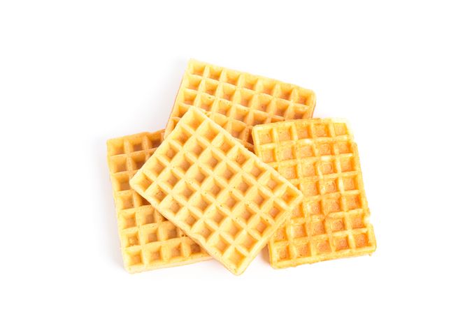 Sweet Belgian waffles isolated on blank background