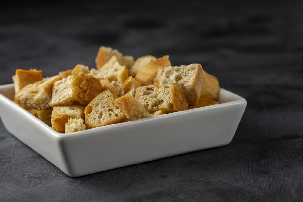 Delicious crunchy croutons on the table.