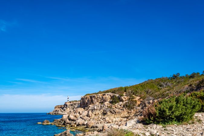 Cala Portinax bay with beautiful azure blue sea water
