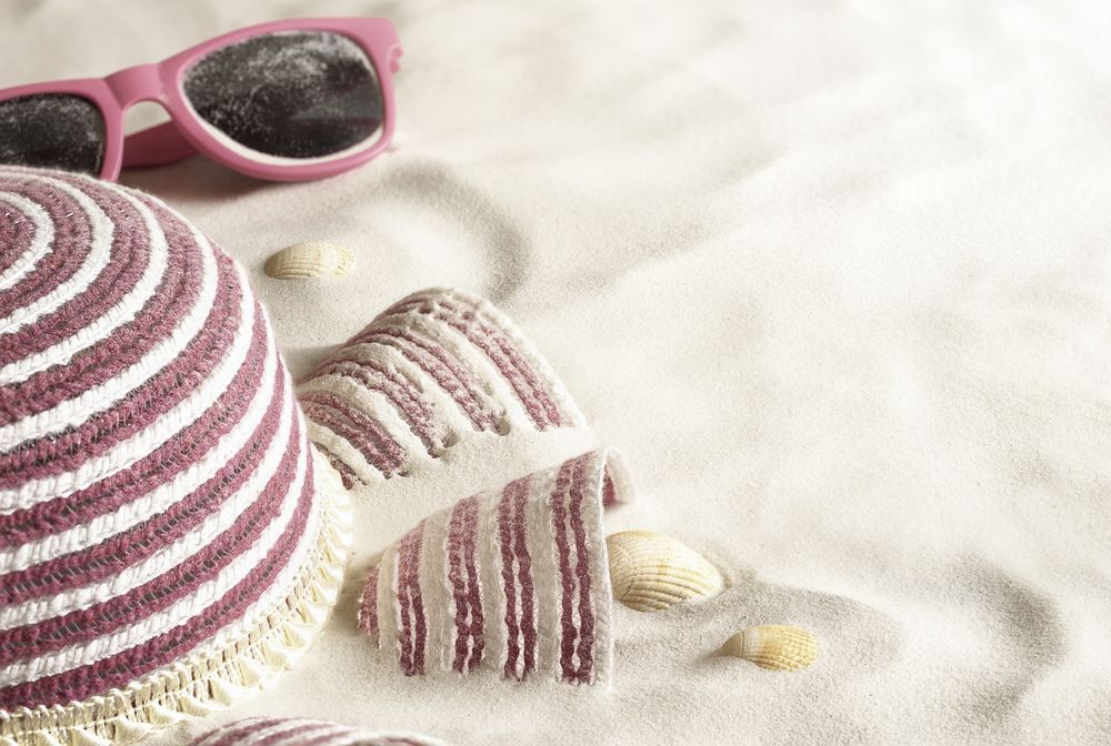 Pink hat in fine sand