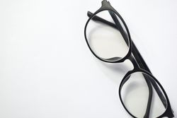Glasses on blank background with copy space