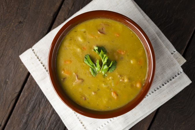 Pea soup. Bowl with pea soup on the table