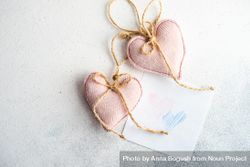 Valentine Day holiday card concept with felt pink heart decorations and heart drawing 5zrrPX