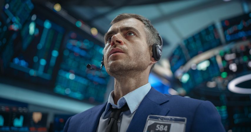 Close Up Portrait of a Smart and Thoughtful Stock Exchange Broker.