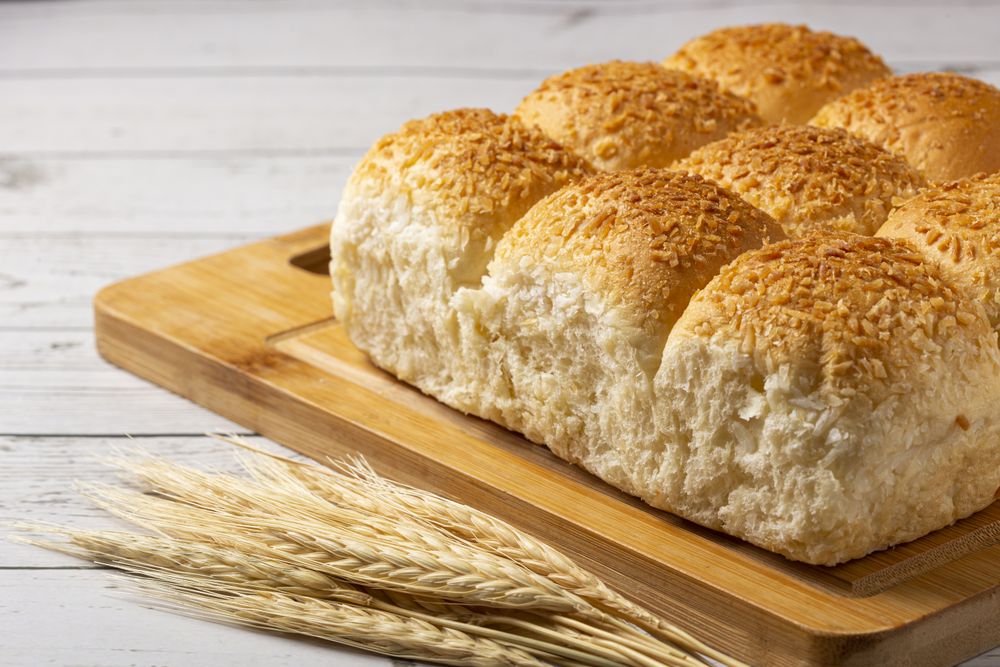 Coconut bread on the wooden table.
