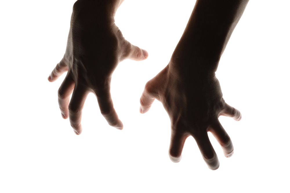 Scary human hands isolated on plain background