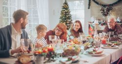 Family, Children, Friends and Young Couples Gather at Home for a Festive Christmas Dinner.