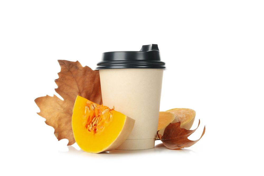 Paper cup of pumpkin latte isolated on blank background