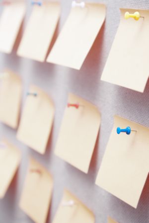 Sticky notes on a bulletin board