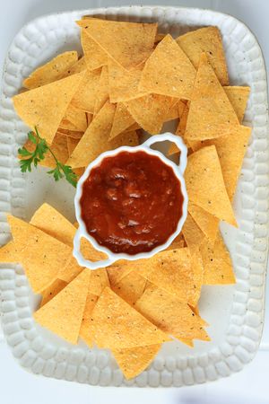 Nachos Corn Chips with Spicy Tomato Salsa Sauce