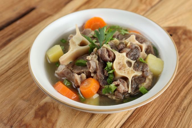 Indonesian Oxtail Soup or Sop Buntut in Bowl