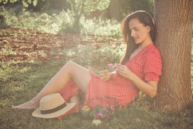 Adult woman in park on sunny day