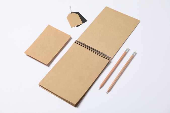 Composition with blank stationery on blank background, space for text