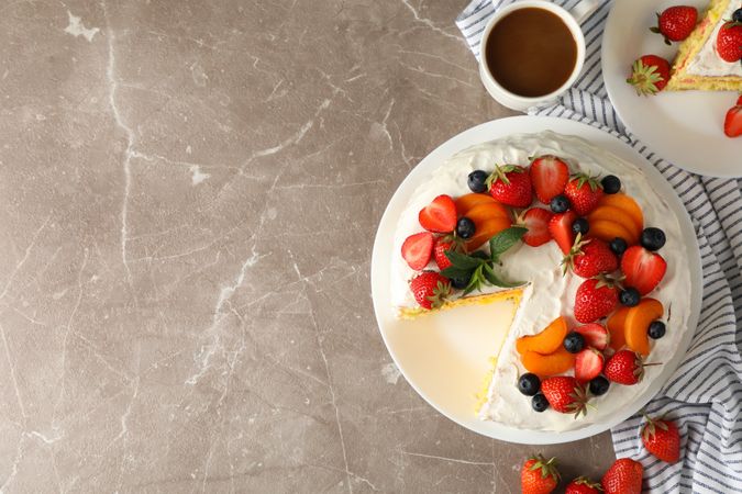Composition with delicious berry cream cake. Tasty dessert