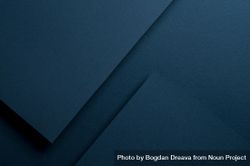 Dark blue paper casting shadows 0gzj3b