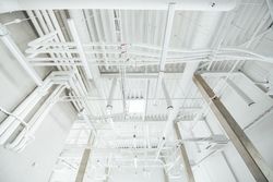 pipes and cables in industrial building