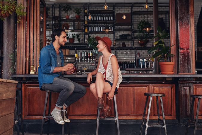 Young man and woman at coffee shop