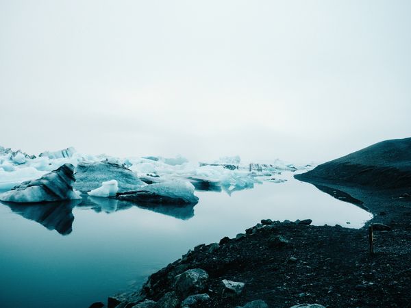 Ice on water between snow