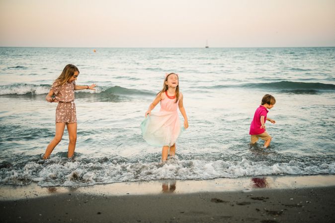 Kids playing in shallow water