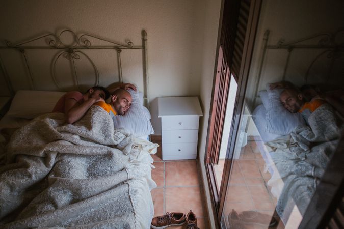 Gay couple in bed