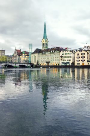 View of the Fraumunster Church from the shoreline of the Limmat