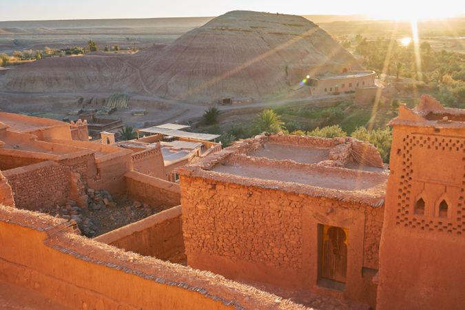 Ancient city near river in desert and wonderful sky