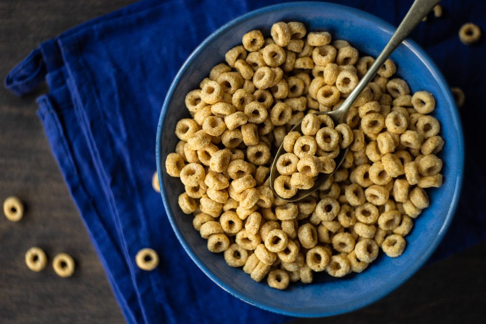 Top view of bowl of cereal in blue bowl