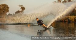 Man practicing water sport on large lake 56BBj5